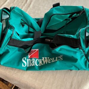 Snackwell duffel bag with side pockets